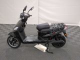 an image of a scooter parked on a checkered floor