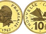 a close up of a coin with a boat on it