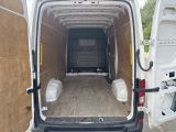 a white van that is parked in a lot
