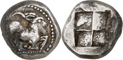 a silver coin with an image of a horse on it