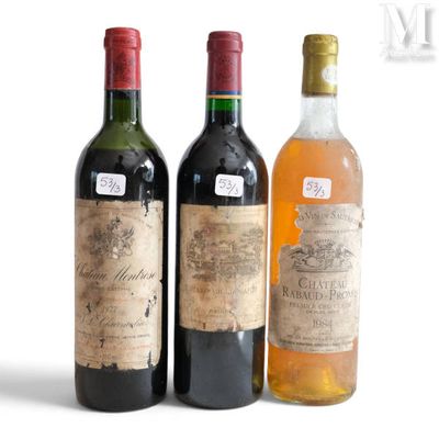 three bottles of wine sitting next to each other on a white surface