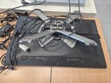 a lot of wires that are on top of a laptop