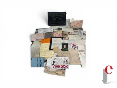 a pile of old papers on a white surface
