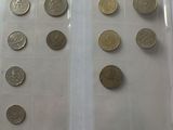 a lot of coins in a plastic bag on a table