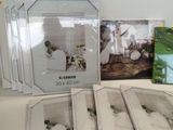 a lot of pictures on the table and a picture of a bride