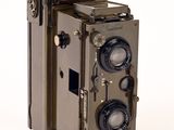 an old camera that is sitting on a table