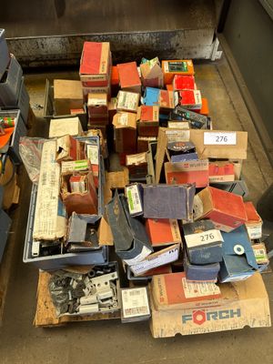 a pile of boxes and boxes on the ground