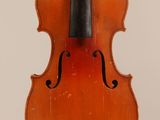 an old violin with a black bow on a white background