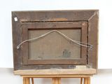 a picture of an old wooden frame on a stand