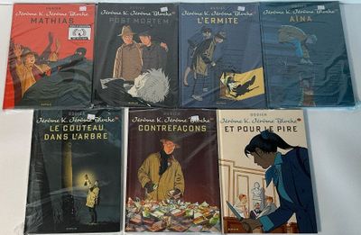 un grand nombre de livres posés sur une table
