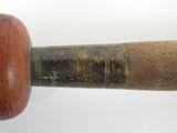 a baseball bat with a wooden handle on a white background