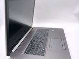 a laptop computer that is sitting on a table