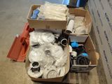 a box of assorted items sitting on the floor