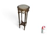a small table with a marble top on a white background