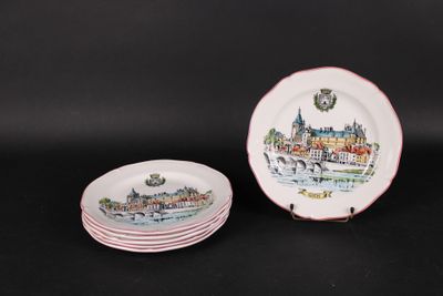 trois assiettes sur lesquelles figure l'image d'une ville