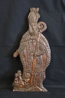 an image of a statue of a woman holding a child