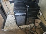 a lot of computers that are stacked on top of each other