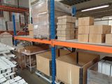 many boxes and boxes on the shelves in the warehouse