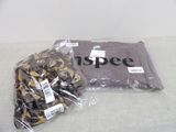 two bags of t - shirts and a bag of chocolates
