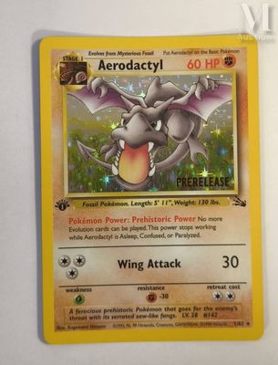 a close up of a pokemon card on a white surface