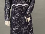 an image of a mannequin wearing a black lace dress