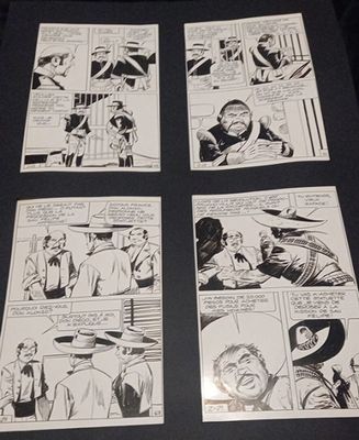 quelques bandes dessinées en noir et blanc posées sur une table avec un fond noir
