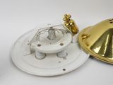 a white plate with a gold dome and a white plate with a gold dome on it