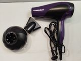 a hair dryer and a blow dryer sitting on a table