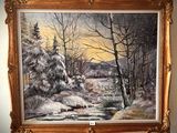 a painting of a snowy landscape hanging on a wall