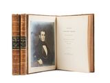 a book opened to show a picture of a man in a suit and tie