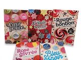 three books of different flavors of candy and sweets on a white background