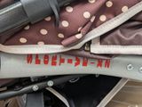 a close up of a bag with a handlebar attached to it