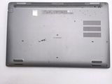 a laptop with a broken screen sitting on a table