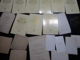 a lot of papers that are on a table