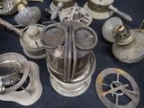 a lot of old metal items that are on the table