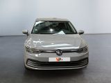 the front of a silver volkswagen vw golf parked in a showroom
