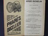 an old book with a picture of a camera on it ' s cover