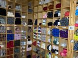 a room filled with lots of different colored yarns