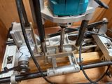 a machine that is sitting on top of a piece of wood