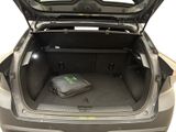 a suitcase in the trunk of a car with the trunk open