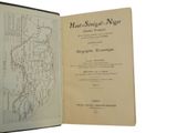 an open book with a map of a town on it