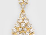 an image of a gold and diamond pendant