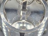 a silver object that is sitting on a table