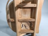 a wooden table with a shelf on top of it