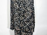 une robe à pois noirs et blancs sur un mannequin, un mannequin, un mannequin, un mannequin, un mannequin, un mannequin, un mannequin, un mannequin, un mannequin, un mannequin, un mannequin, un mannequin, un mannequin, un mannequin, un mannequin, un mannequin, un mannequin, un mannequin, un mannequin, un mannequin, un mannequin, un mannequin, un mannequin, un mannequin, un mannequin, un mannequin, un mannequin, un mannequin, un mannequin, un mannequin, un mannequin, un mannequin, un mannequin, un mannequin, un mannequin, un manne