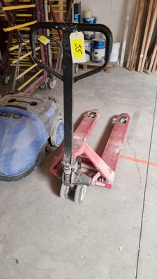 a picture of a forklift sitting in a garage