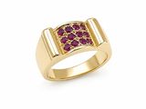 un gros plan d'une bague en or sertie de rubis