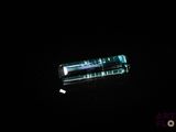 an image of a piece of glass in the dark