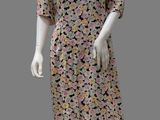 a mannequin wearing a dress with a floral pattern