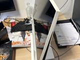 a desk with a laptop and a monitor on it